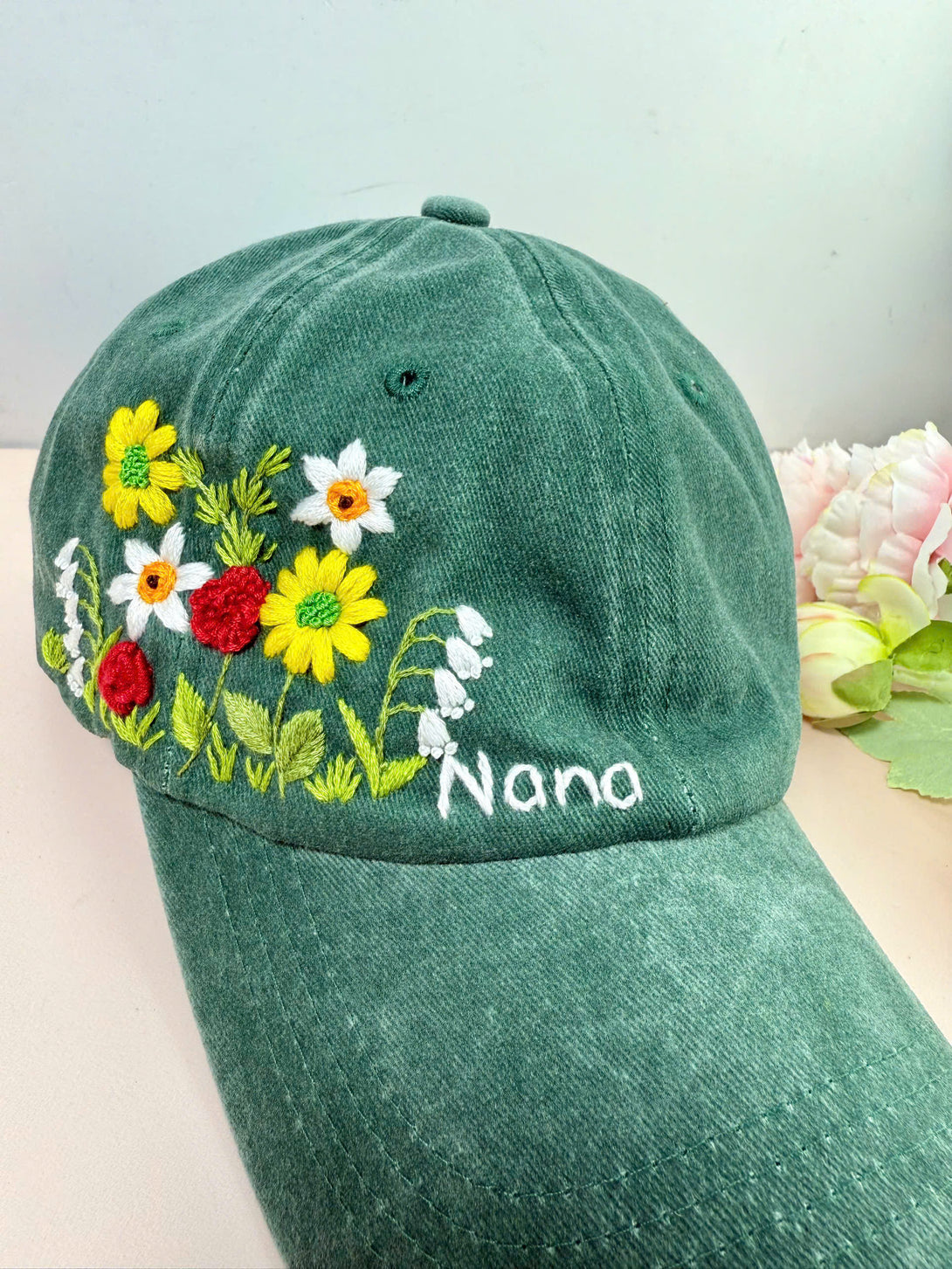 Flower Garden Personalised Embroidered Hat in green with colorful floral embroidery and custom name Nano