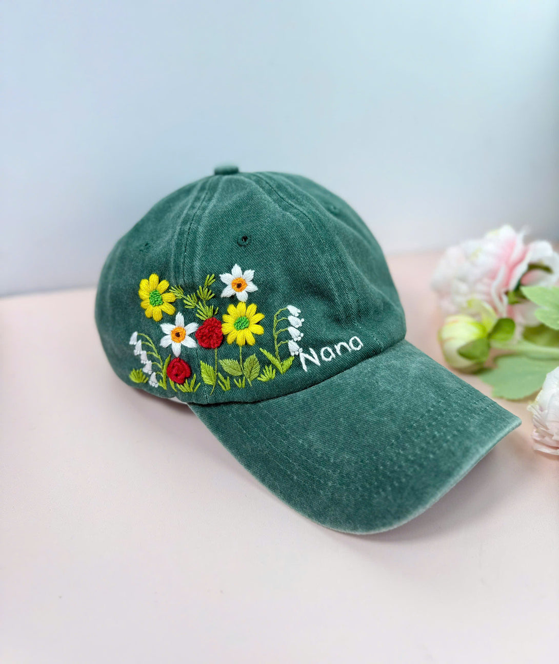 Flower Garden Personalised Embroidered Hat in green with colorful floral embroidery and custom name by Stitchery Zone