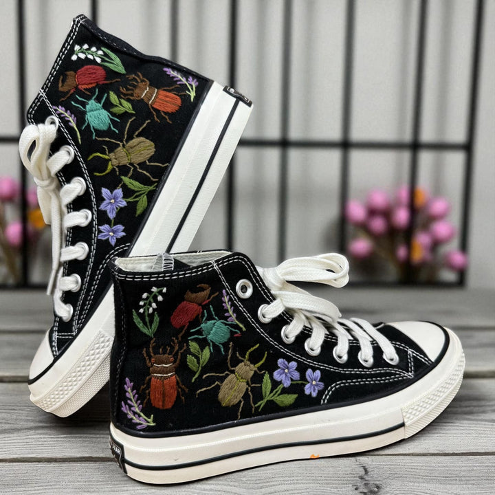 Halloween Vibes Embroidered Sneakers with colorful bug and flower designs on black high-top canvas shoes