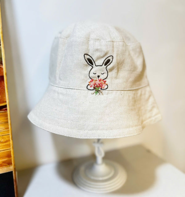 Hand Embroidered Rabbit Linen Baby Hat in beige with cute floral embroidery from Stitchery Zone
