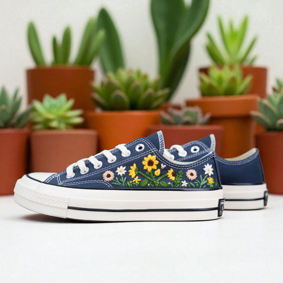 Hand-stitched flower low top sneakers by Stitchery Zone in navy with colorful embroidered floral design