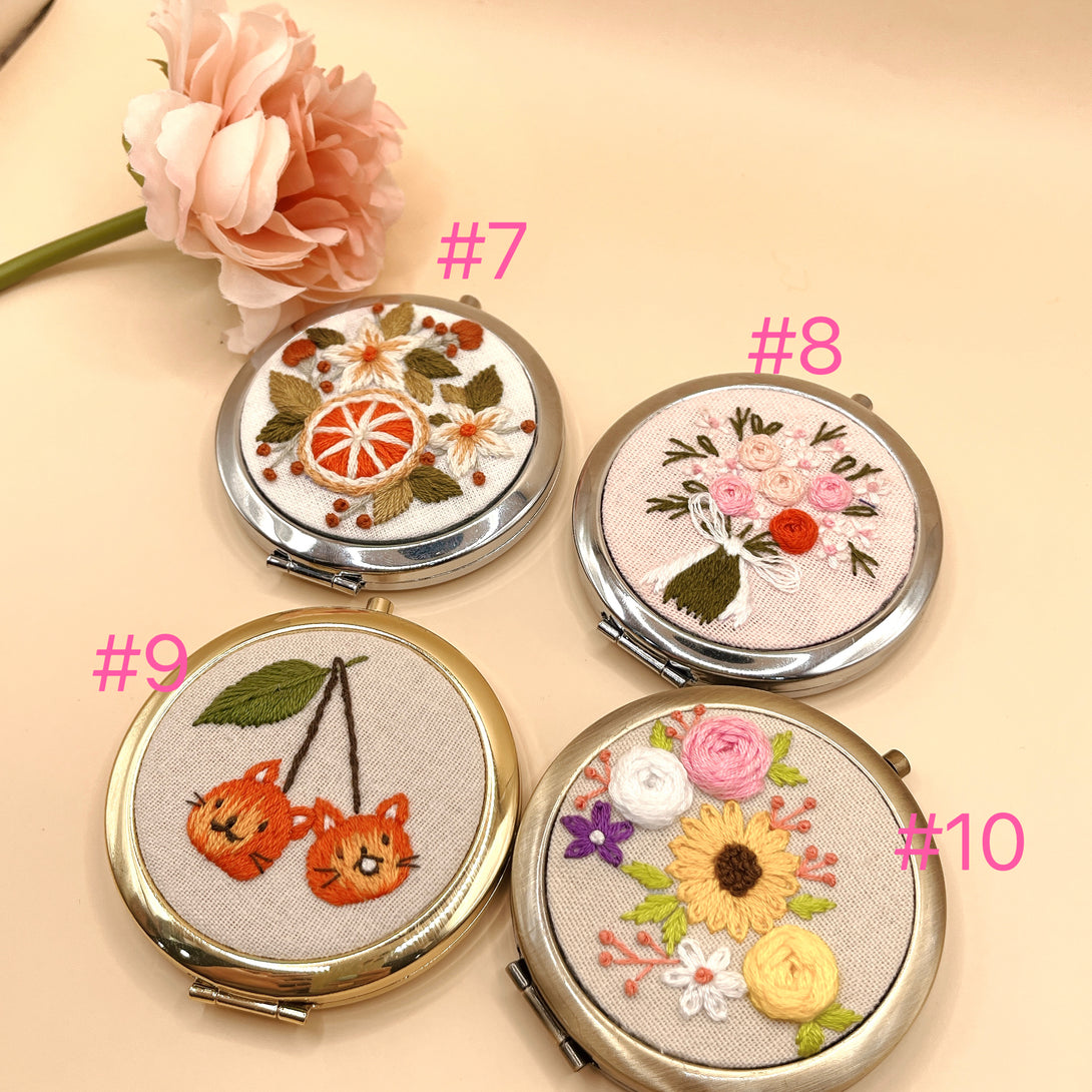 Handmade embroidered small mirror with floral and fruit designs in metal cases from Stitchery Zone