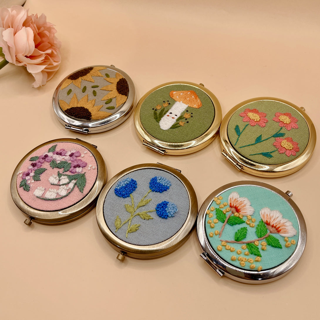 Handmade embroidered small mirror collection with floral and mushroom designs from Stitchery Zone