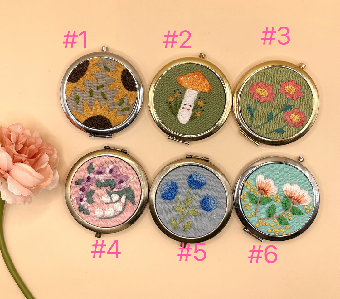 Handmade embroidered small mirror collection with floral and mushroom designs by Stitchery Zone