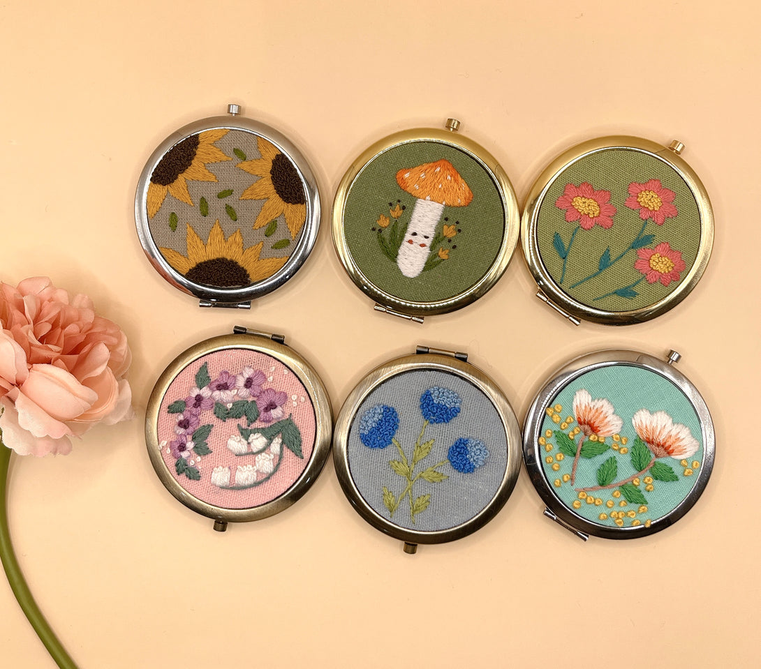 Handmade embroidered small mirror collection by Stitchery Zone featuring floral and mushroom designs