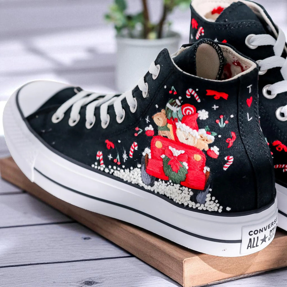Black high top Xmas Embroidery Converse with Santa in a red truck, candy canes and snowy embroidered details