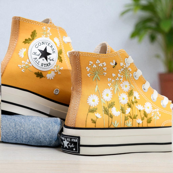 Stitchery Zone Daisy Embroidered Converse high top yellow canvas sneakers with hand embroidered white daisies and green stems