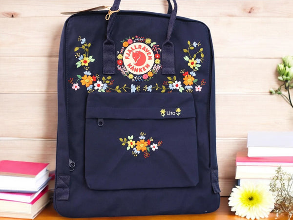 Stitchery Zone navy school backpacks with floral embroidery and front pocket for students