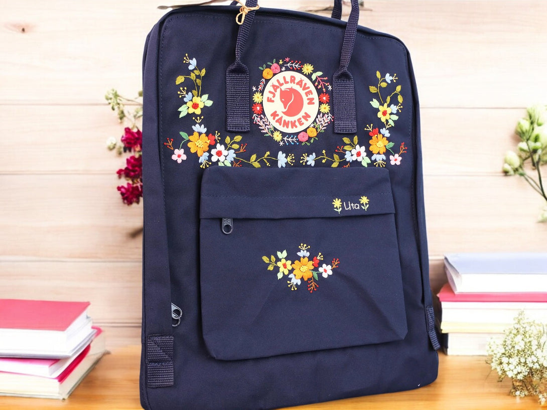 Stitchery Zone Floral Embroidered School Backpack in Navy Blue with a Front Pocket