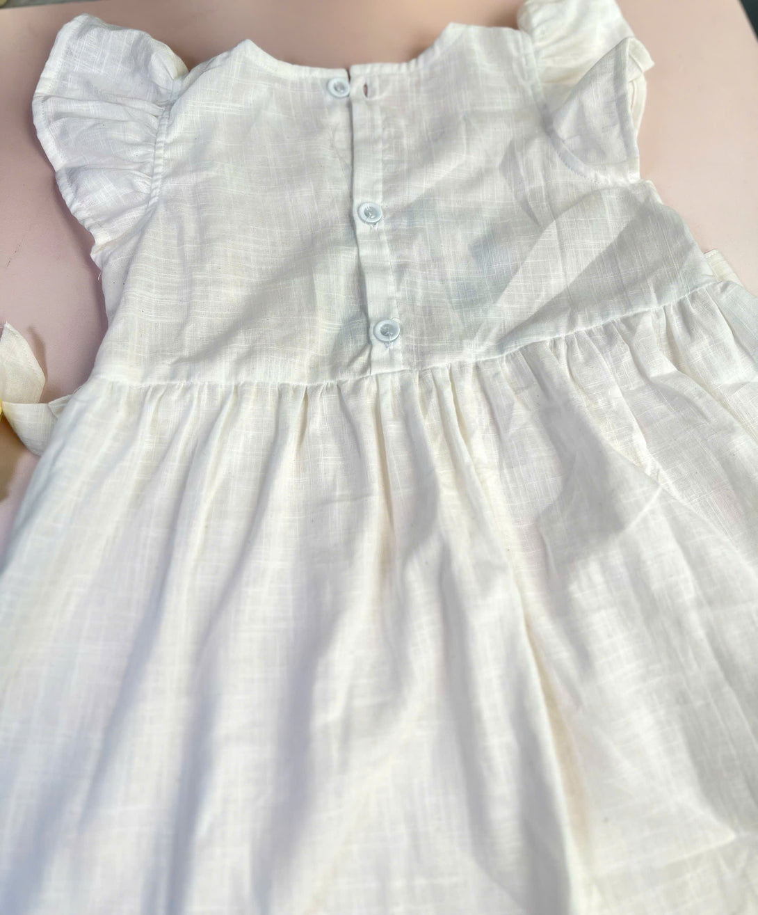 White little fox cotton dress by Stitchery Zone with button back and flutter sleeves