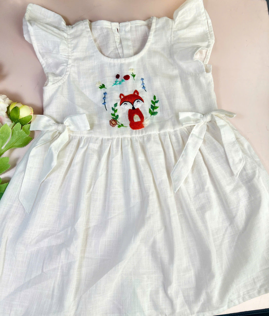 Stitchery Zone little fox cotton dress in white with embroidered fox and floral design and short flutter sleeves