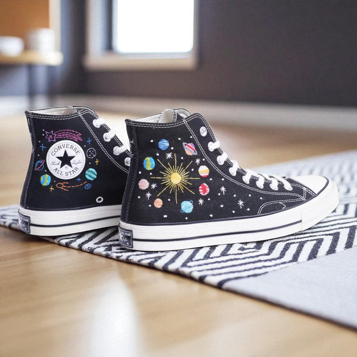Moon Converse embroidered shoes featuring a cosmic design with planets and stars