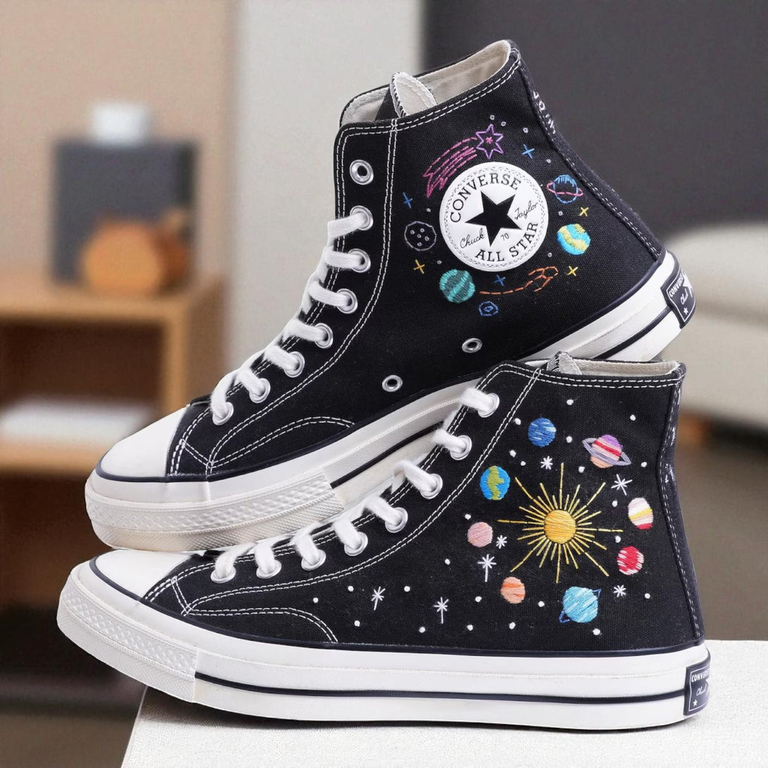 Moon Converse embroidered high-top shoes featuring a galaxy design with planets and stars