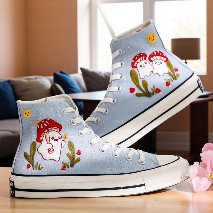 Mushroom Converse high-top shoes featuring blue fabric and whimsical mushroom embroidery