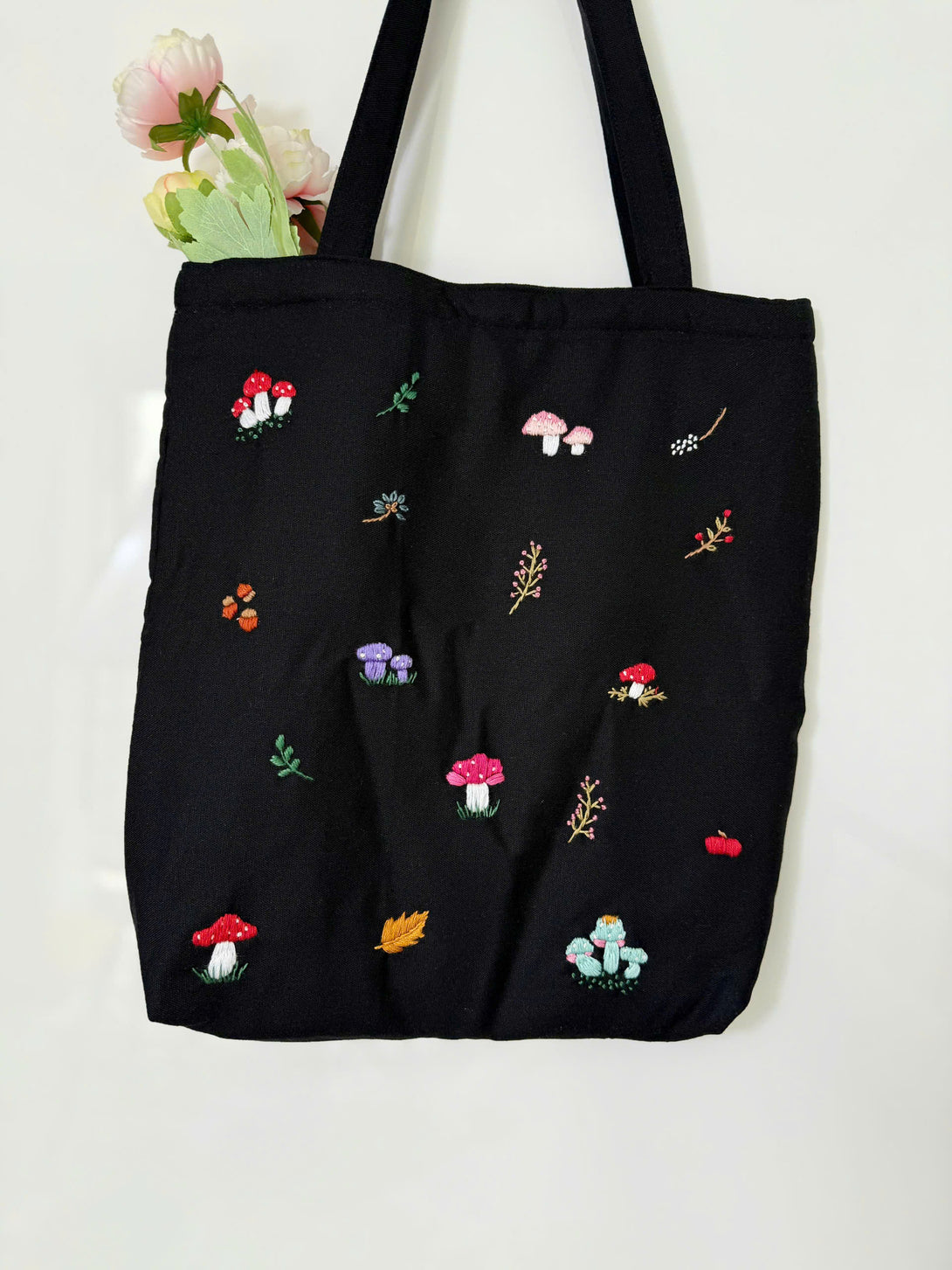 Stitchery Zone Mushroom Embroidered Tote Bag in black with colorful mushroom and floral embroidery