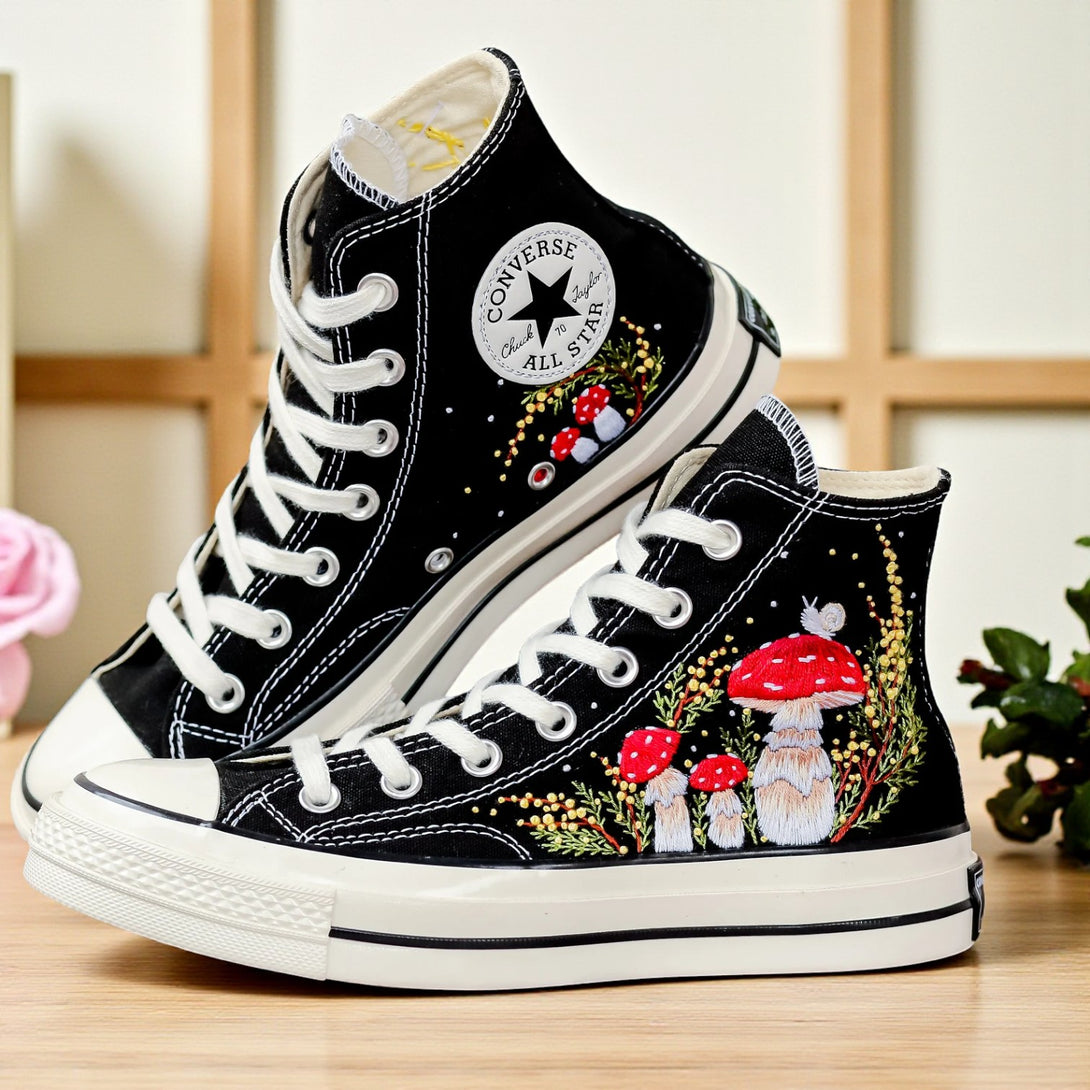 Converse high-top embroidered shoes featuring colorful mushrooms shoes design on a black background