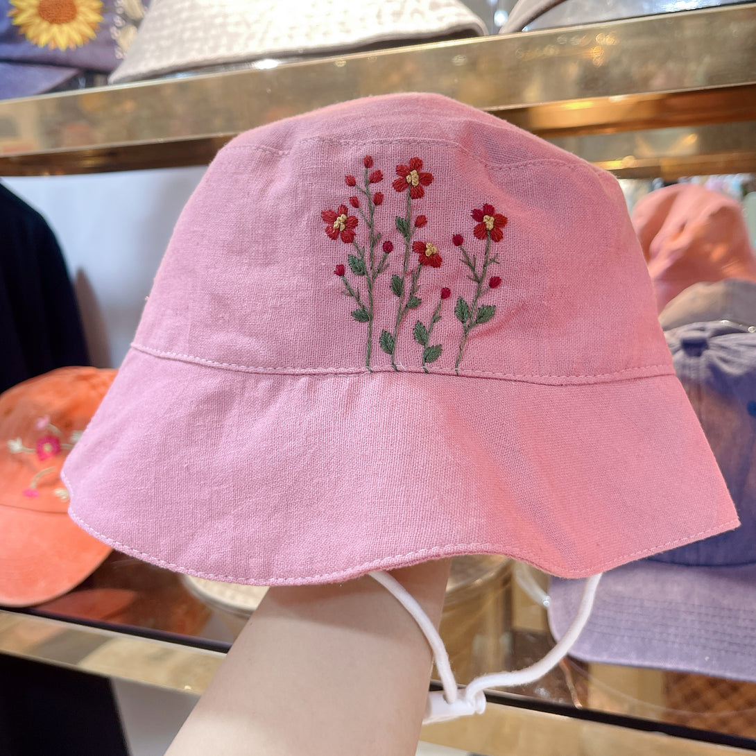 Pink flowers Embroidered Linen Baby Hat by Stitchery Zone with delicate floral embroidery and soft pink fabric