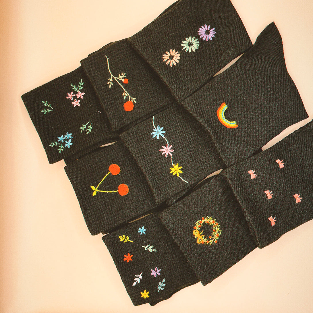 Black socks featuring colorful floral and rainbow embroidery Style Socks Embroidered For Women by Stitchery Zone