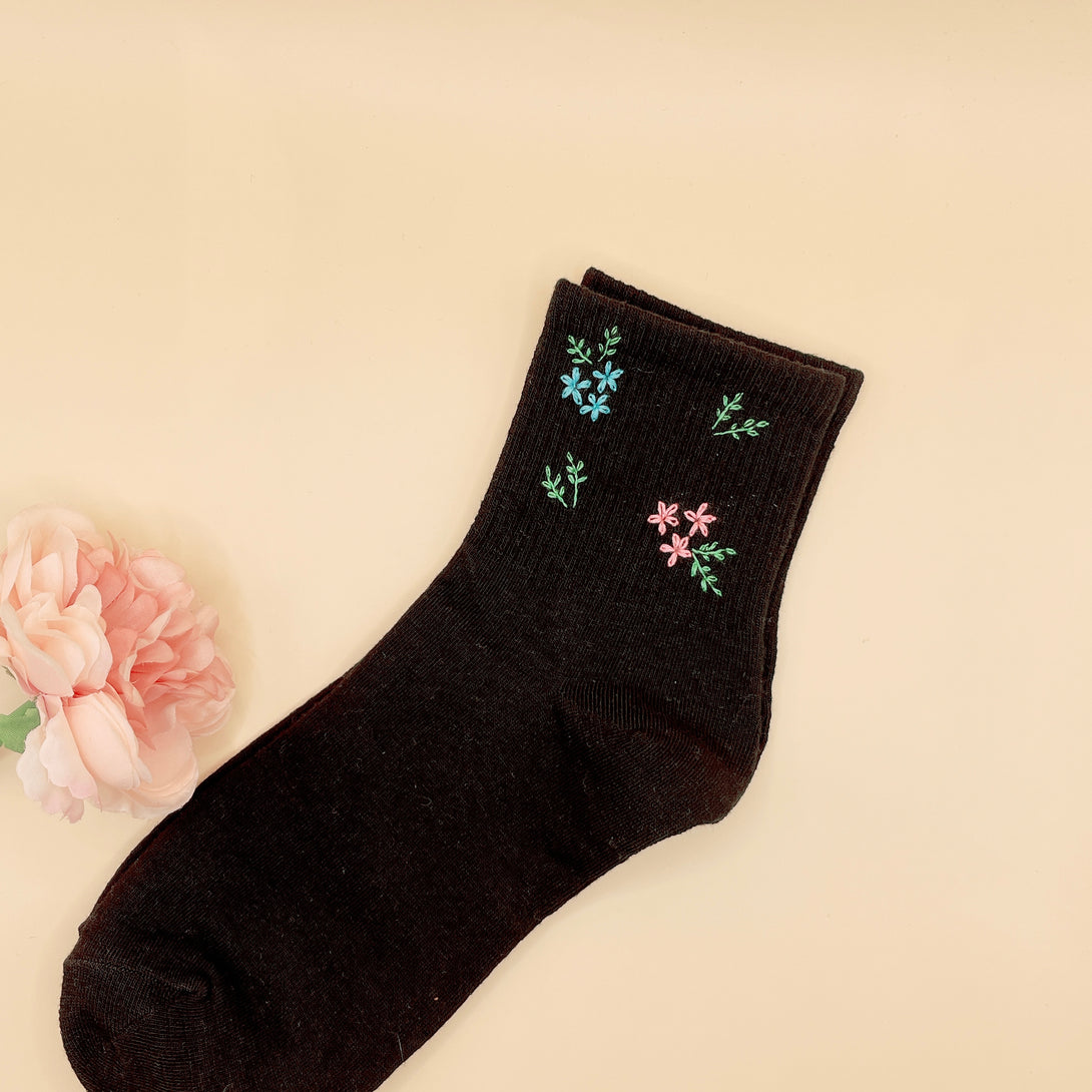 Black embroidered socks with blue and pink flower designs Style Socks Embroidered For Women by Stitchery Zone