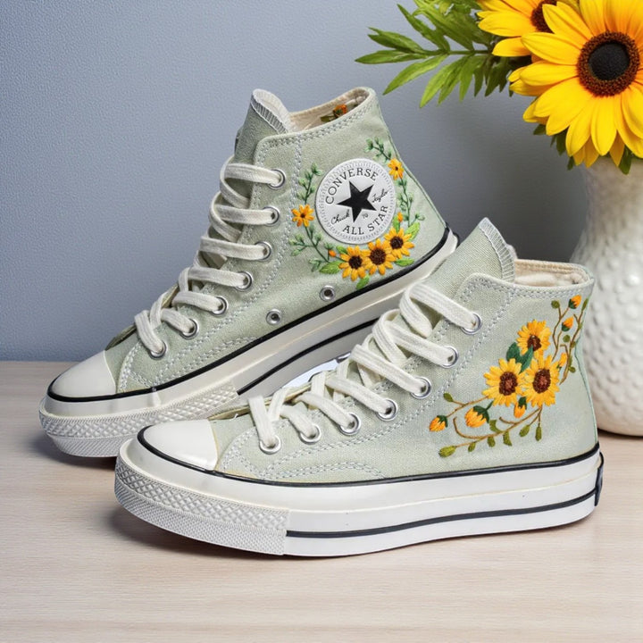 Sunflower Converse high-top shoes with vibrant floral embroidery and classic design