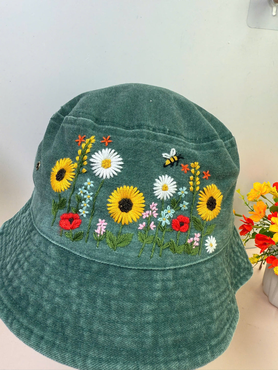 Sunflower Hand Embroidered Bucket Hat in green with colorful floral and bee embroidery by Stitchery Zone