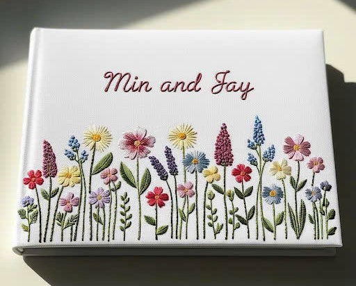 Unique Handmade Wedding Guest Book by Stitchery Zone with embroidered colorful flowers and customized names