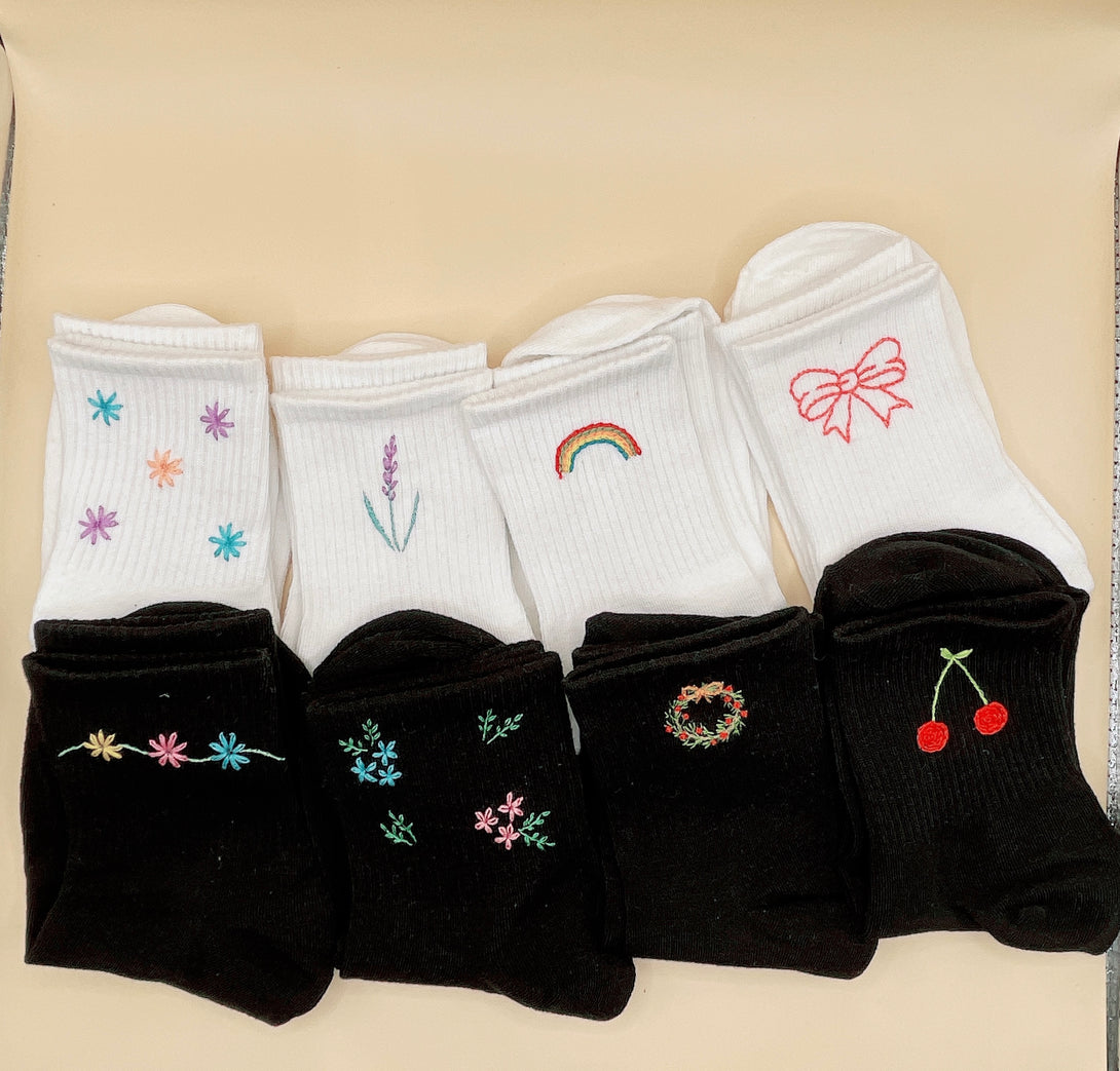 Tennis Socks Embroidered For Women in white and black with colorful floral and fruit designs from Stitchery Zone