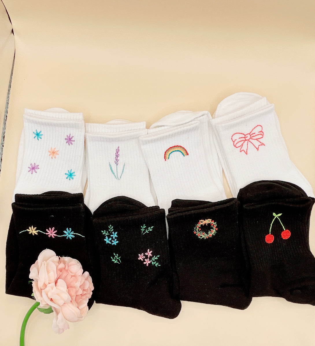 Tennis Socks Embroidered For Women with colorful floral and rainbow designs in white and black pairs