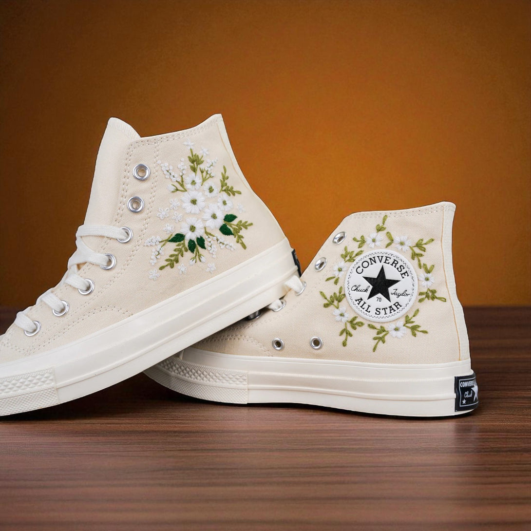 Stitchery Zone embroidered wedding tennis shoes for bride with white floral design on beige high-top sneakers