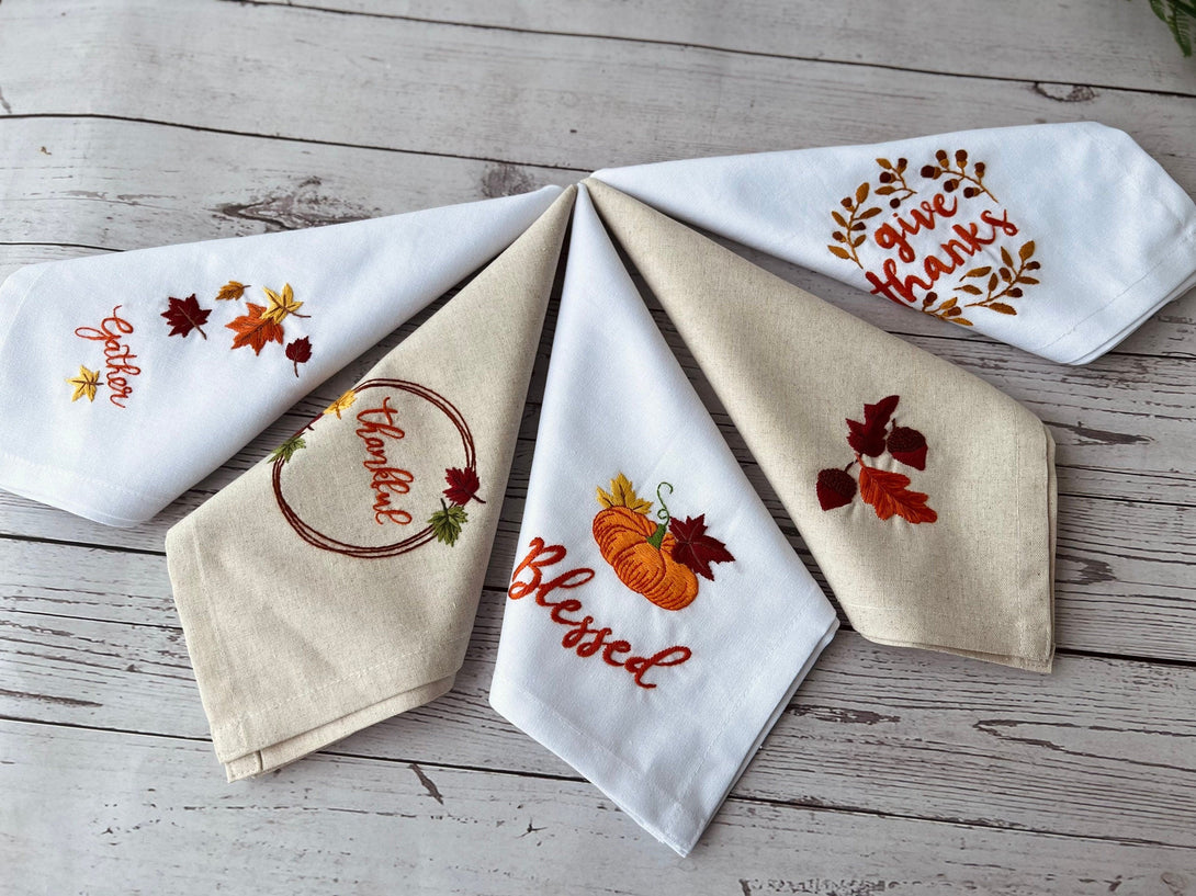 Thanksgiving Hand Embroidered Linen Napkin set with autumn leaves, pumpkin, and gratitude-themed designs